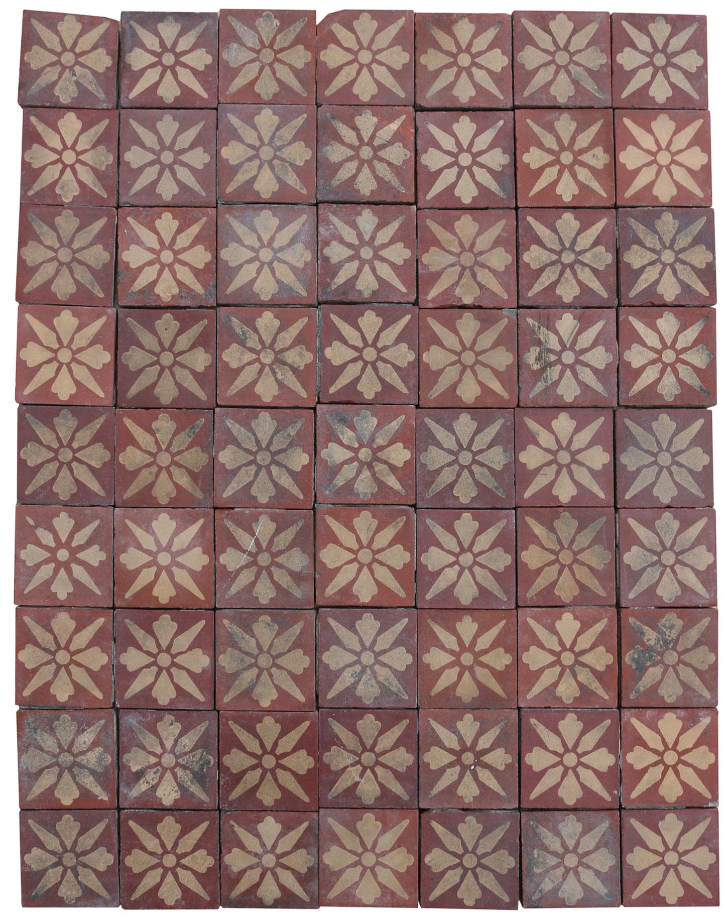 A small group of encaustic floor tiles in two sizes, 2? x 2? (5 x 5 cm) and 3” x 3” (7.5 cm x 7.5 cm).