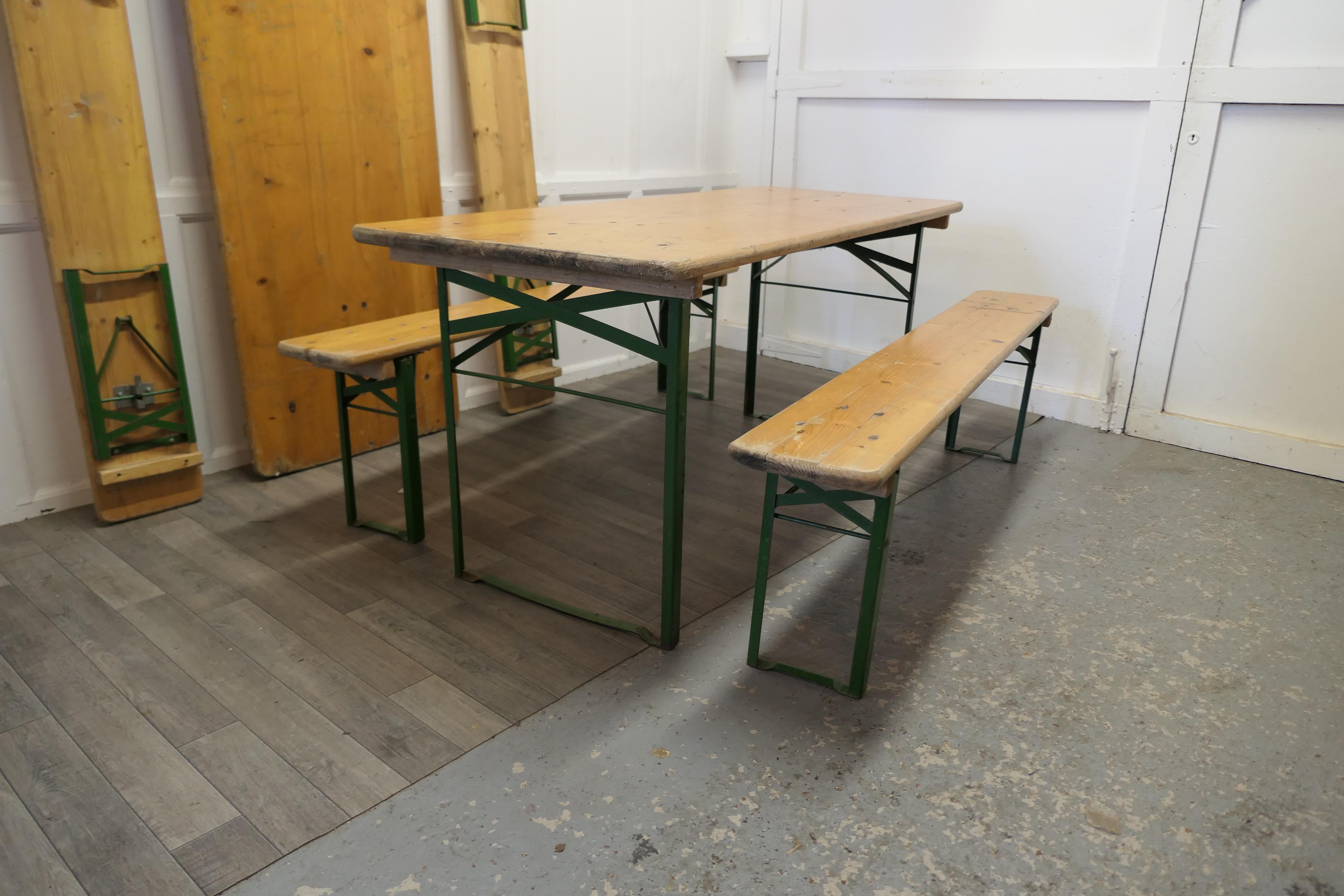 Set of 6ft pine picnic table and benches. 

We have 2 of these available if required 

This is a 6ft Long Picnic Table, the table top is made with 1” thick pine planks as are the 2 benches, they all have sturdy iron legs, painted in green tucked