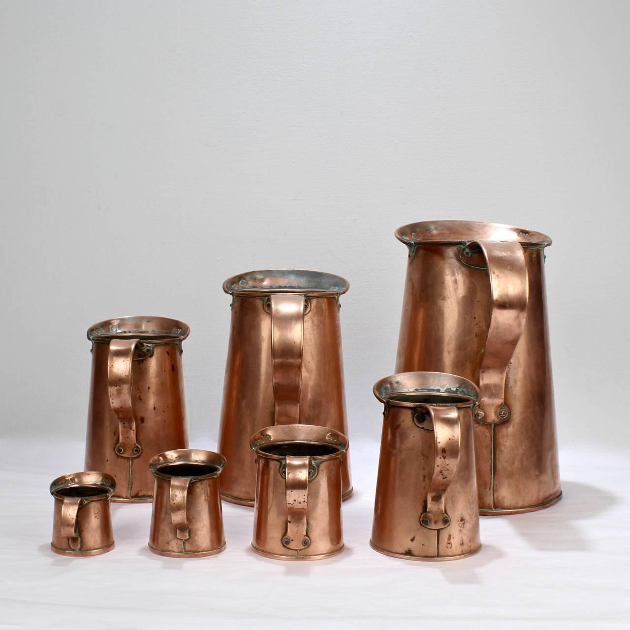 Late Victorian Set of Seven Antique 19th Century New York Graduated Copper Measures by B. Budde