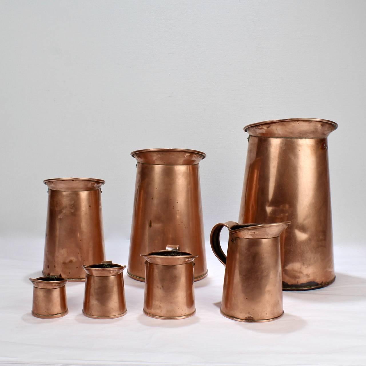 American Set of Seven Antique 19th Century New York Graduated Copper Measures by B. Budde