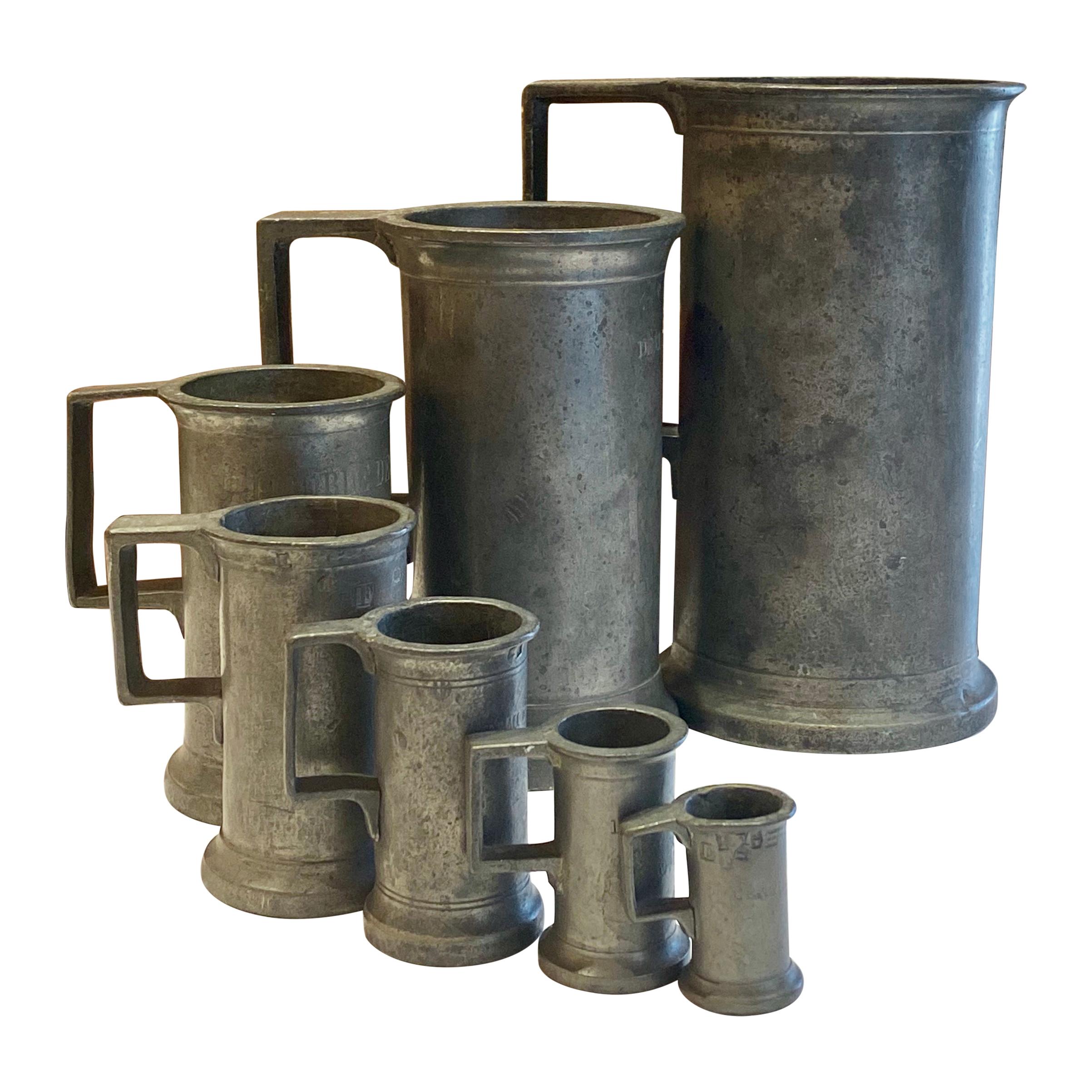 Set of 7 Antique French Pewter Signed Graduated Measuring Tankards, circa 1770s