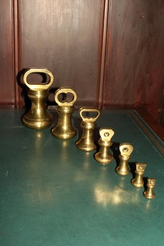 Antique Set of 7 Brass Bell Form Weights