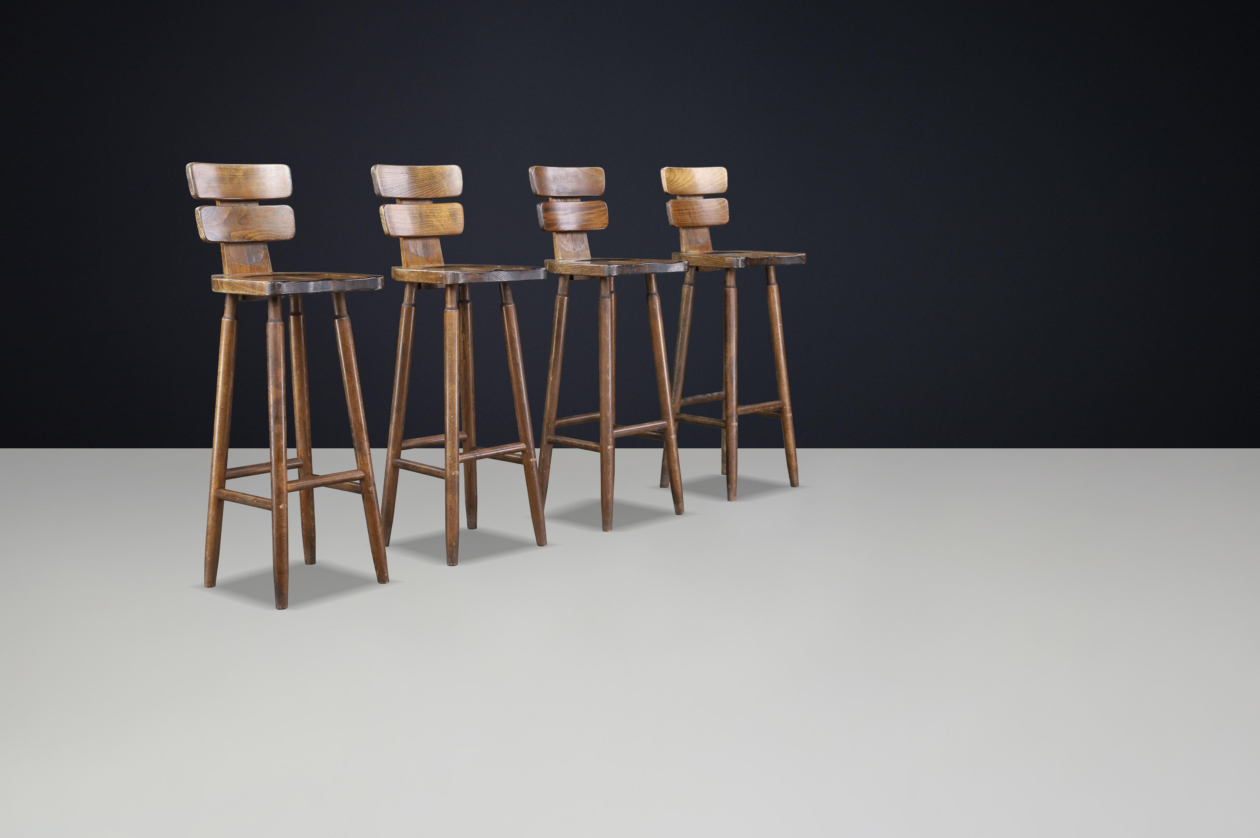 Set of 7 Brutalist Bar Stools in Patinated Beechwood, France, 1960s For Sale 1