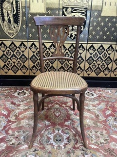 Set of 7 caned bistro chairs Baumann