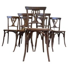 Set of 7 caned bistro chairs Baumann