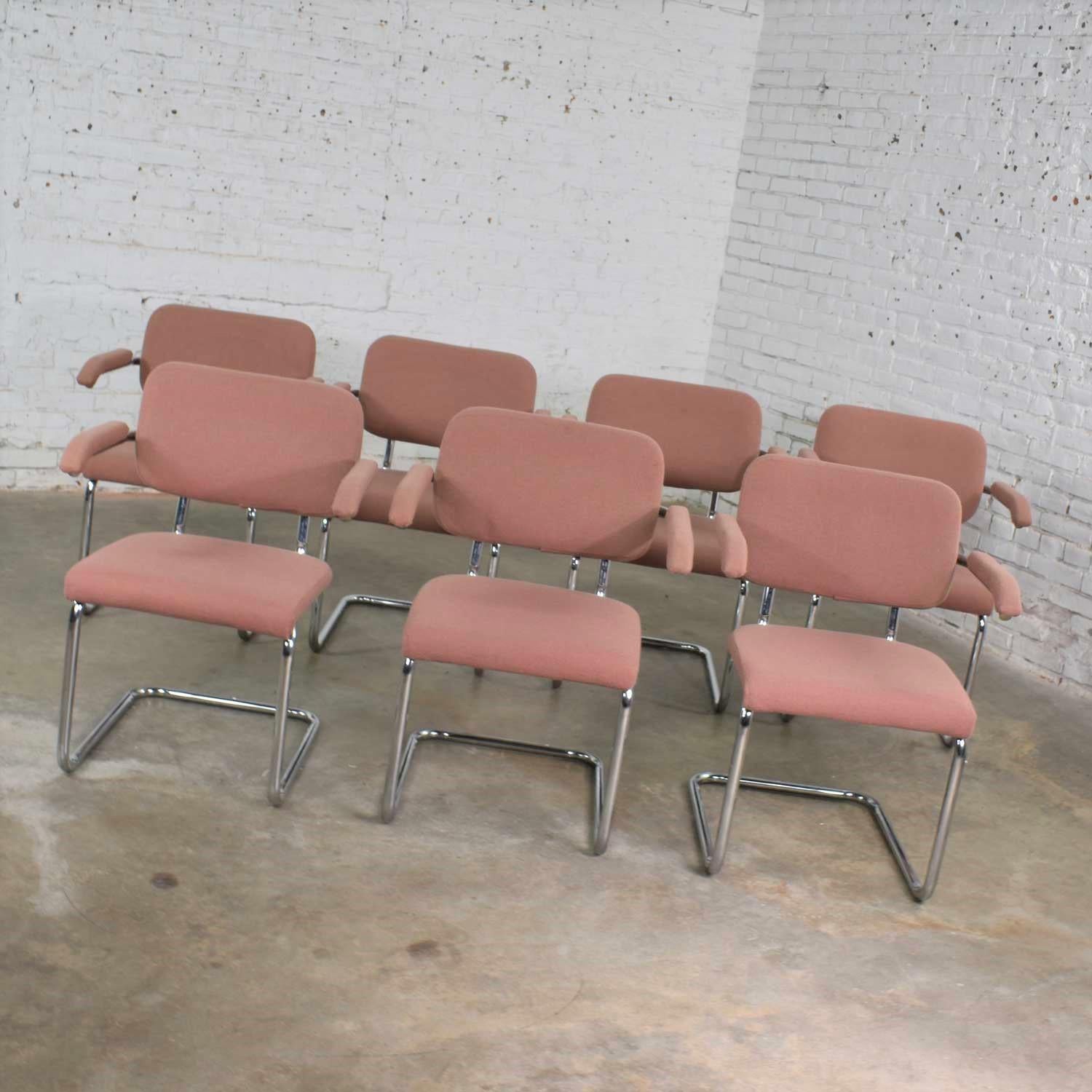 Awesome set of 7 cantilevered tubular chrome and mauve tweed-like fabric upholstered dining chairs in the style of the Cesca chair designed by Marcel Breuer in 1928. This set is made by Virco Manufacturing Company. All seven chairs are in wonderful