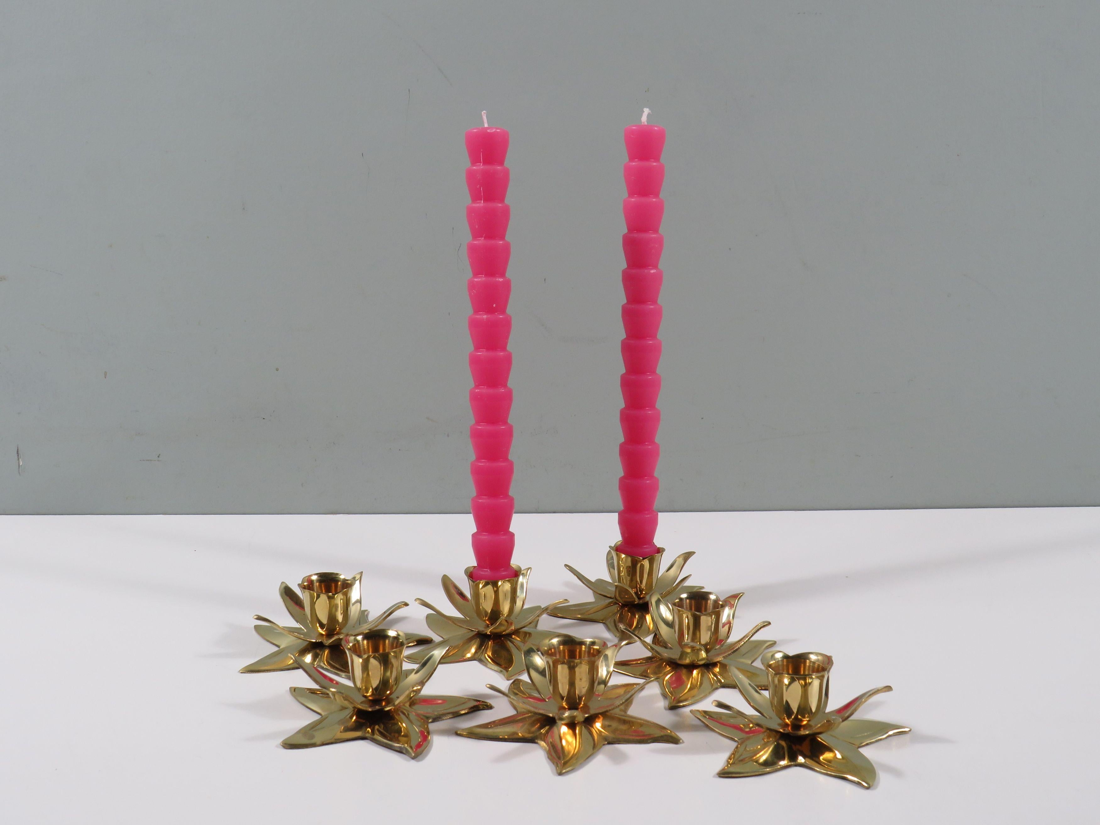  Boho vibes for your interior! 
This set of 7 vintage candlesticks is handmade from heavy shiny brass in India, somewhere between the 70s and 80s - the heyday of the boho style! Think of the time when everything from India and Afghanistan was
the
