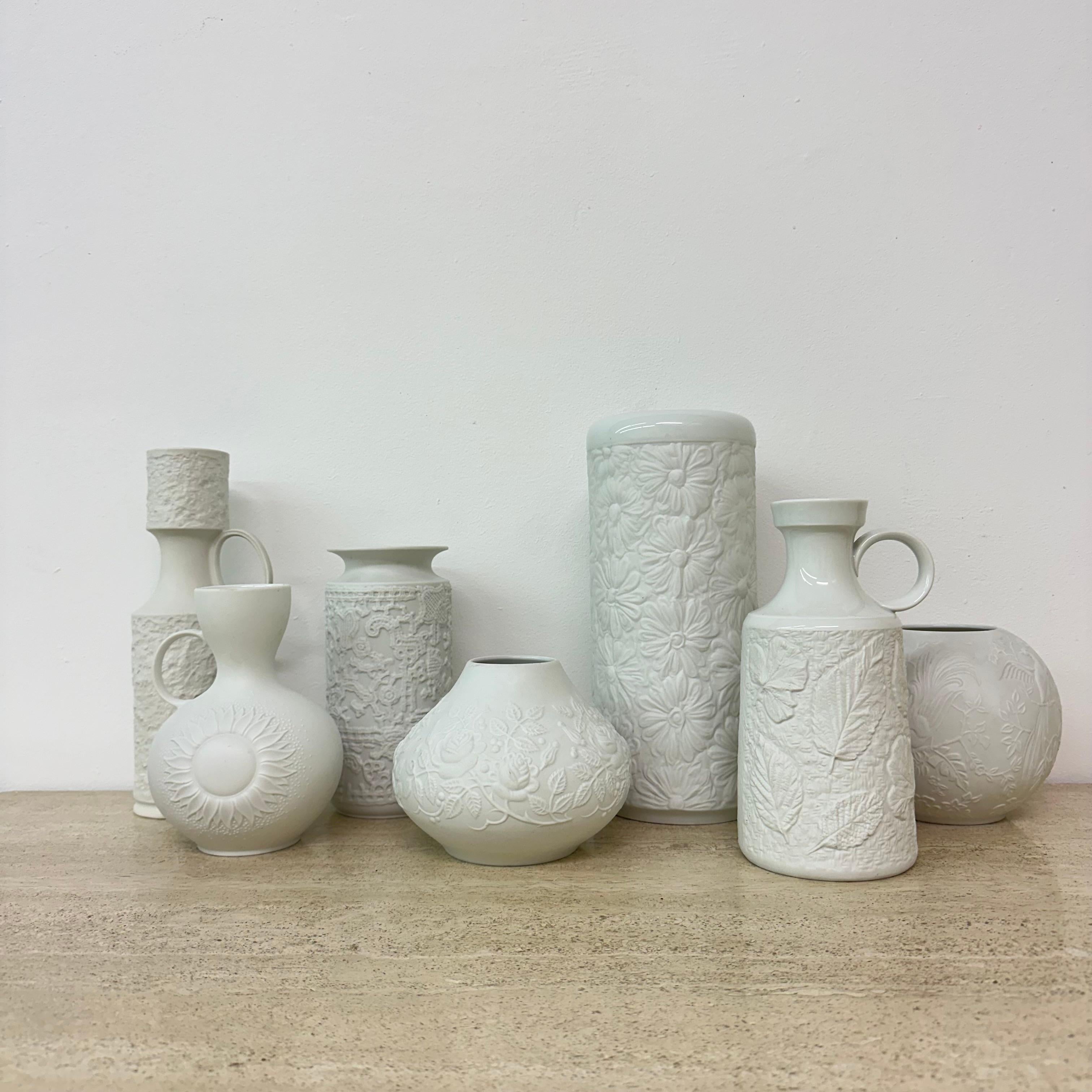 Set of 7 German Bisque vases Kaiser Bavaria , 1960s

Dimensions: 16cm Height 12cm diameter, 18cm Height 10cm diameter ,  11cm Height 14cm Diameter, 26cm Height 11,5cm Diameter, 20cm Height 12cm Width 9,5cmDepth , 25cm Height 10cm Width 7,5cm Depth,