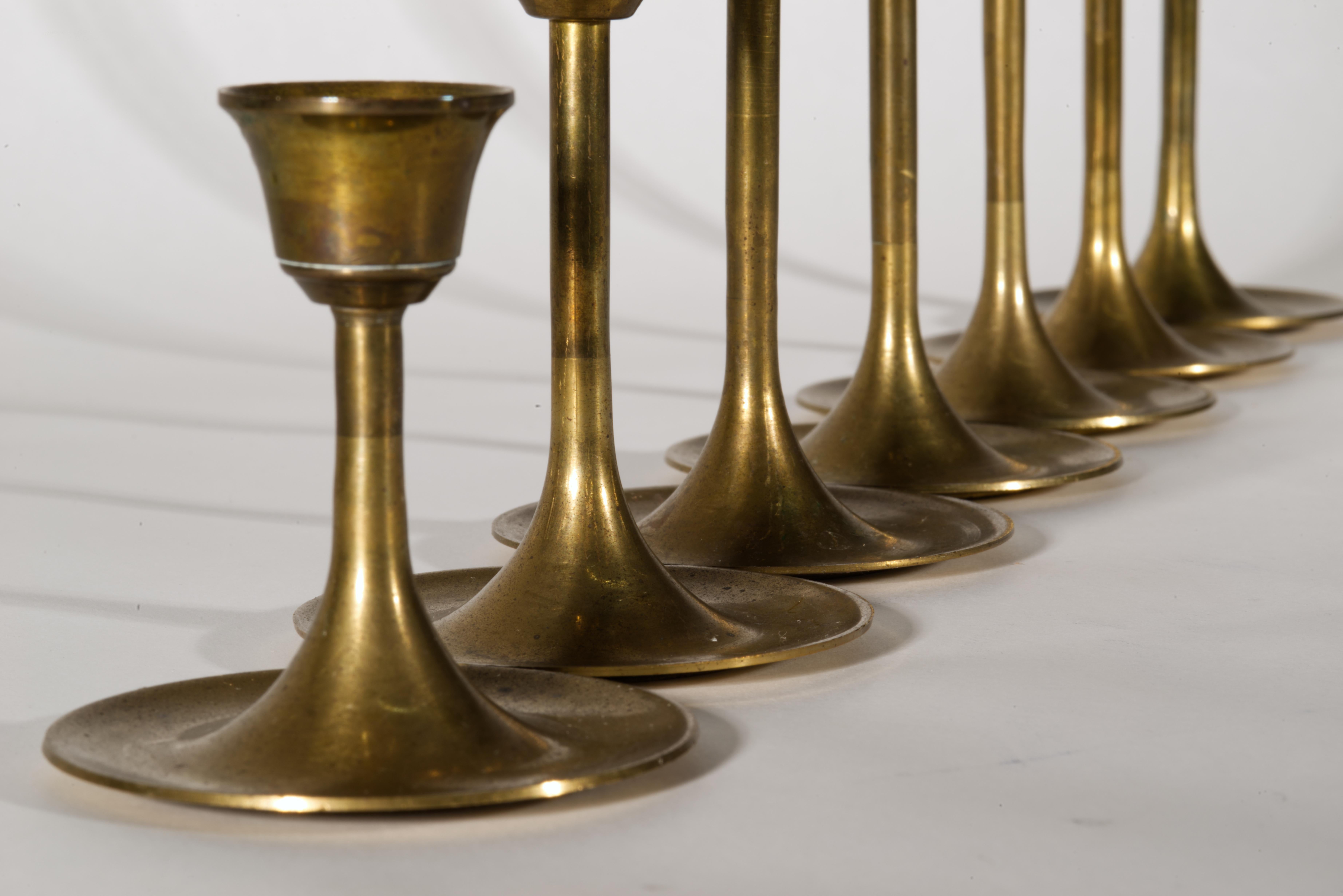 Set of 7 Graduated Scandinavian Modern Brass Candle Holders In condizioni buone in vendita a Clifton Springs, NY