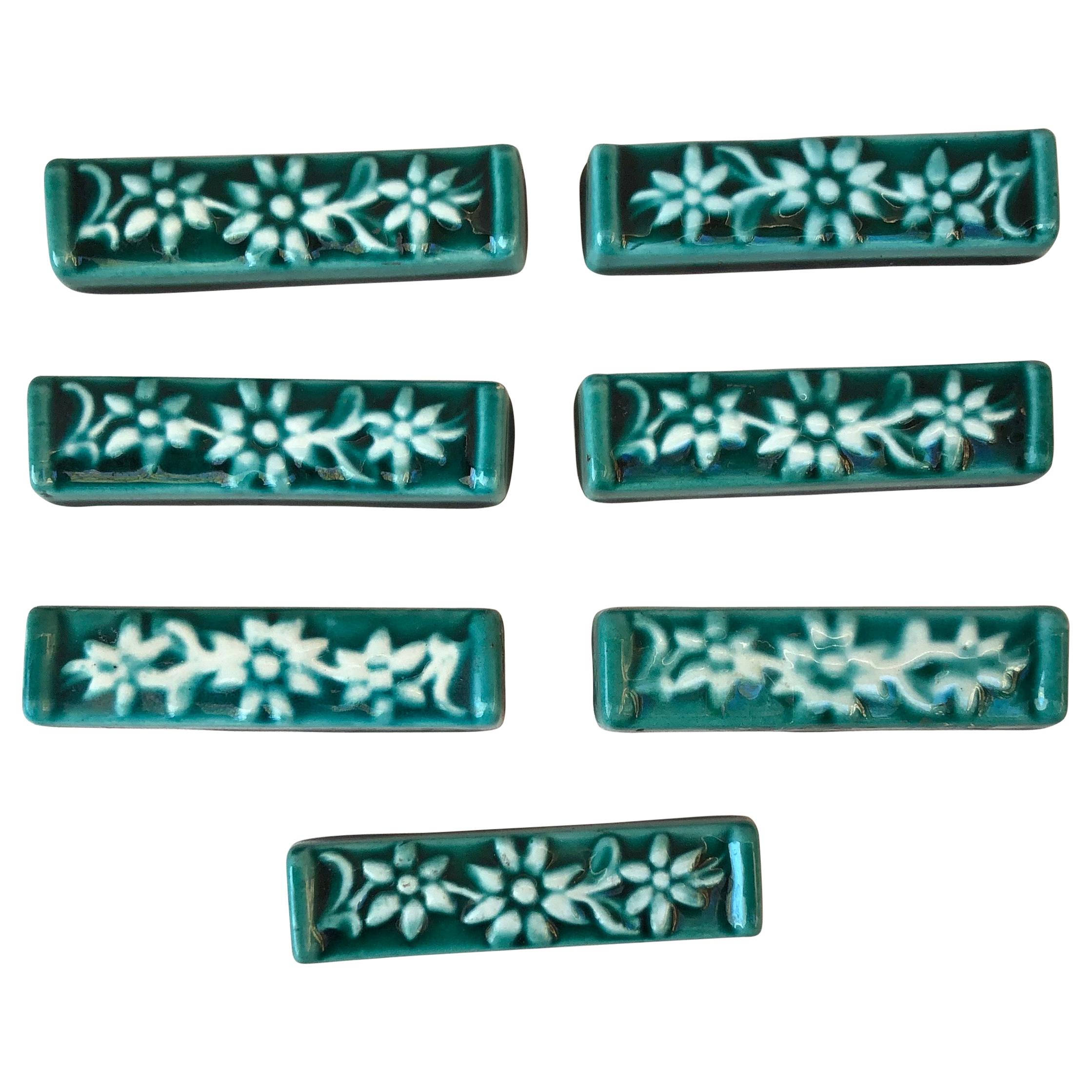 Set of 7 Green Majolica Edelweiss Knife Rests Vallauris, circa 1950 For Sale