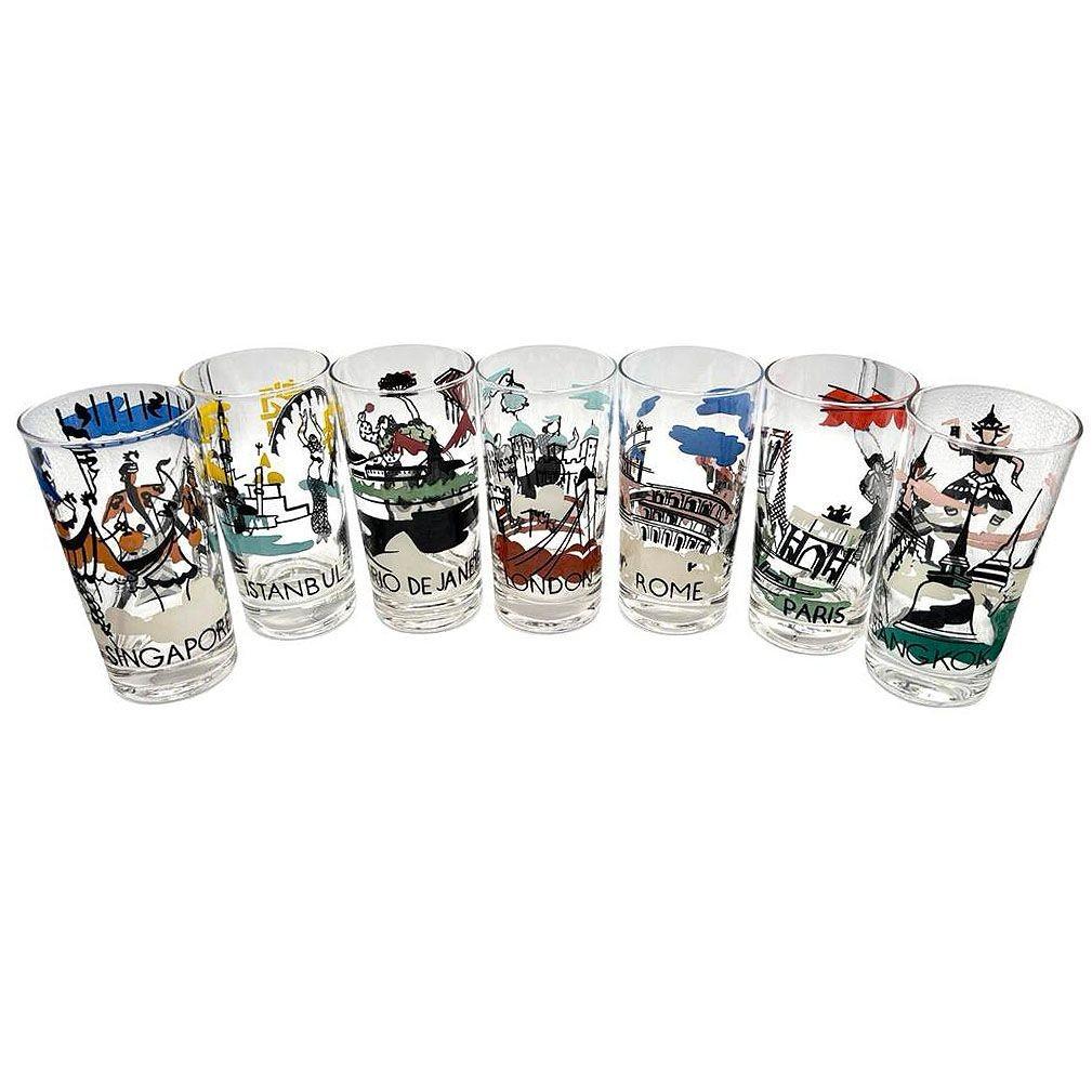 This set of Mid-century seven 12-oz tumbler glasses showcases iconic cities with colorful mid-century designs. Each glass features a scene representing landmarks, culture, and people worldwide. The Cities included are Rio de Janeiro, Istanbul,