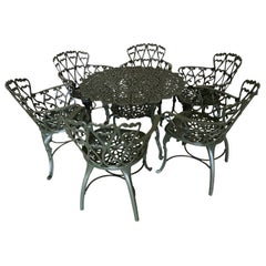 Used Set of 7 Mid-Century Modern Cast Metal Garden Patio Dining Chairs