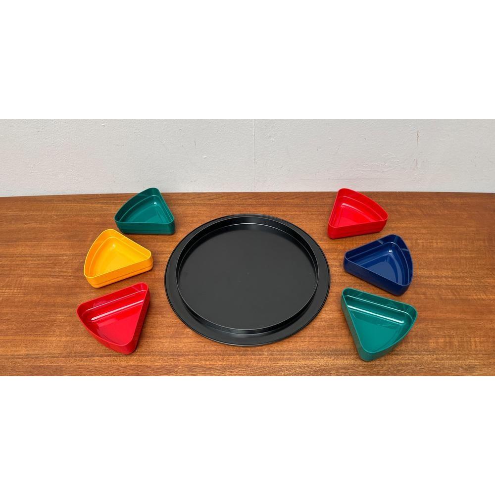 Mid-Century Space Age Bowls and Tray Set from Emsa, 1960s, Set of 7, in Very Good conditions. Designed 1960 to 1969 This piece has an attribution mark.

Additional information:
Materials: Plastic
Style: Mid-Century Modern
Country of Origin: