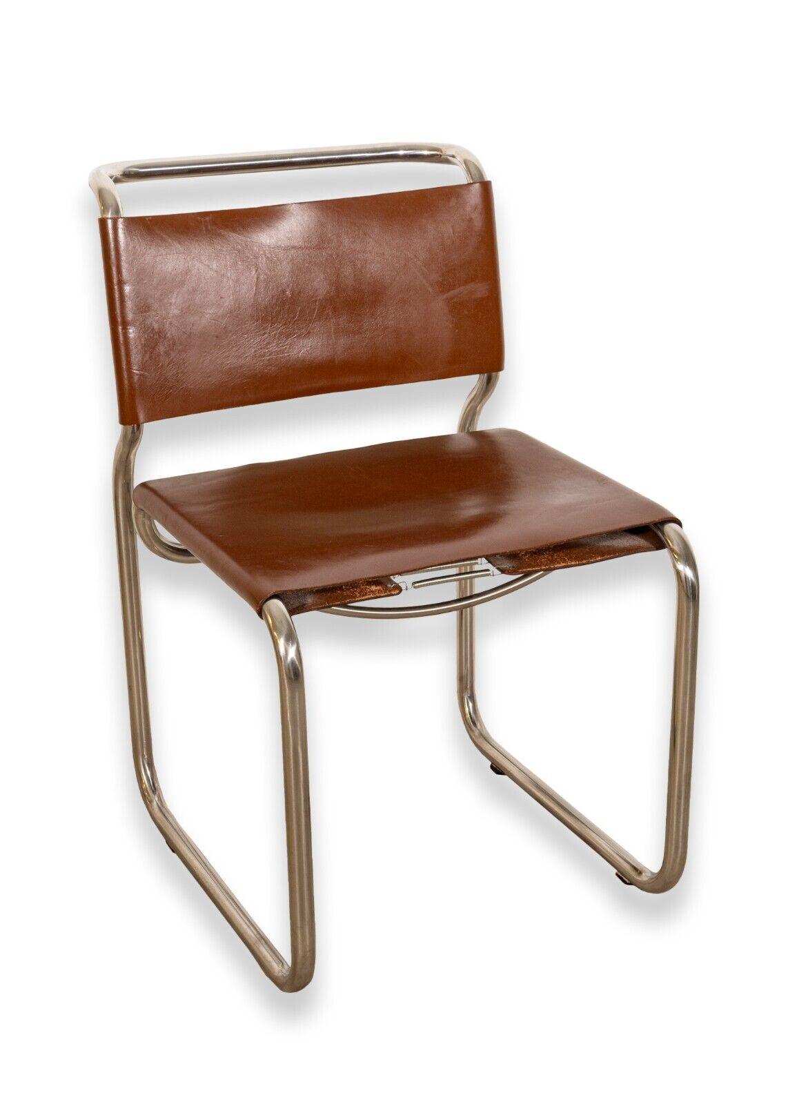 A set of 7 Nicos Zographos CH66 chrome and brown leather cantilever dining chairs. A wonderful set of rare dining chairs from Nicos Zographos. These chairs feature a cantilever design with a chrome finished metal tubular frame, brown leather seats