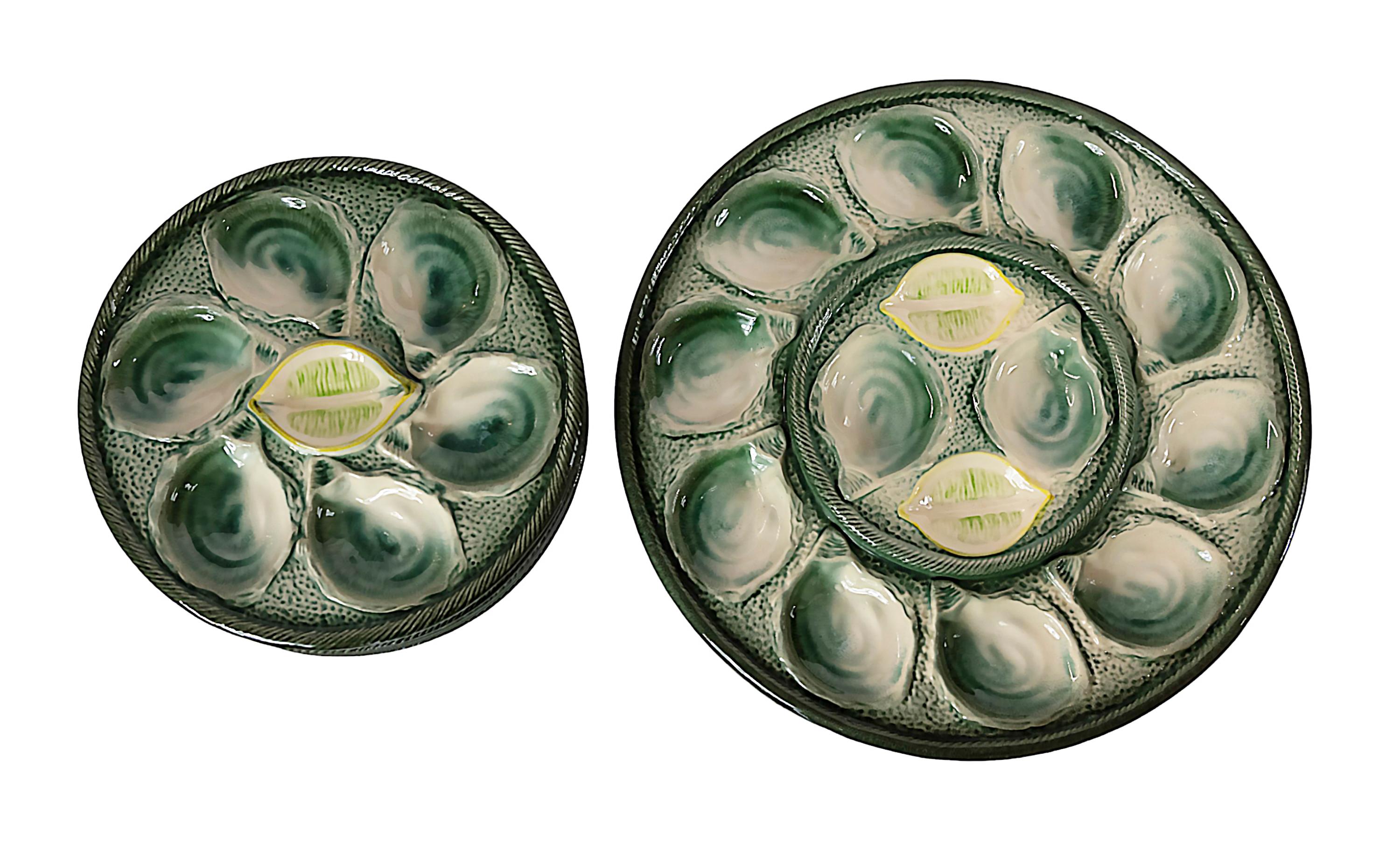 Juego de 7 piezas Platos de ostra de mayólica francesa Saint Clement, hacia 1950 Francés en venta