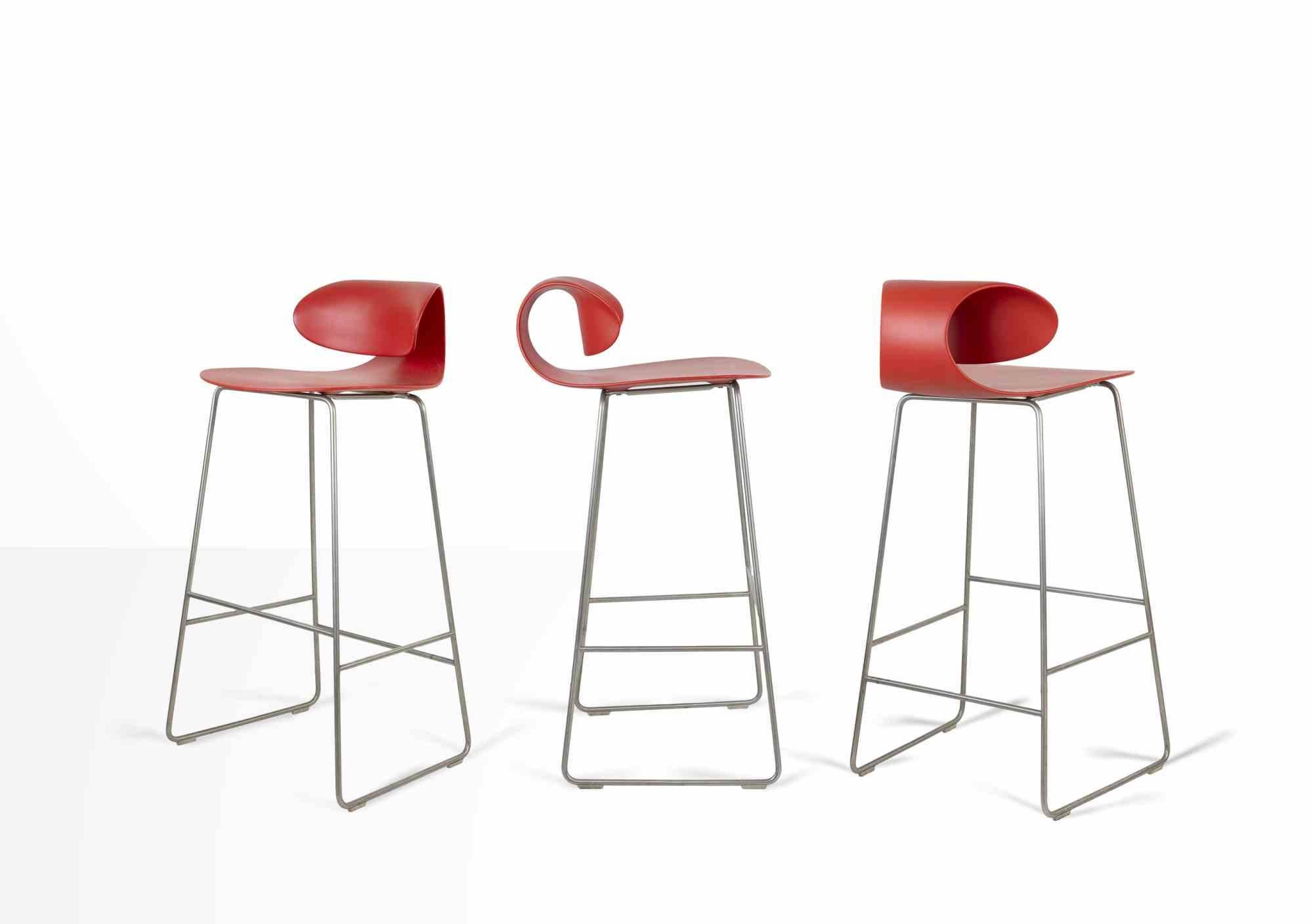 Set of 7 Red Maxima Benches is a design item realized by William Sawaya & Paolo Moroni.

Set of 7 bar stools in molded polycarbonate with steel structure and footrest.

Seat height: 81.28 cm

Sawaya & Moroni, born in 1984 from an idea by Paolo