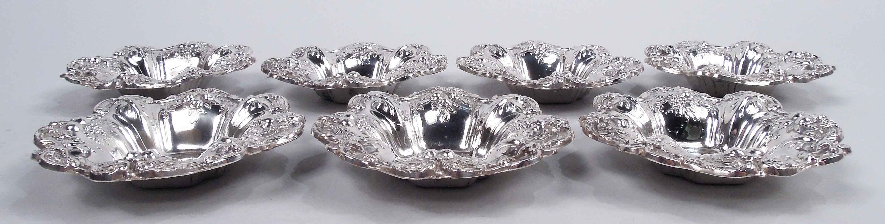 Set of 7 Francis I sterling silver nut dishes. Made by Reed & Barton in Taunton, Mass. 1951-52. Quatrefoil well, lobed sides, and scrolled rim. Embossed fruits and leaves. Nice pieces in the classic pattern. Fully marked including maker’s stamp,