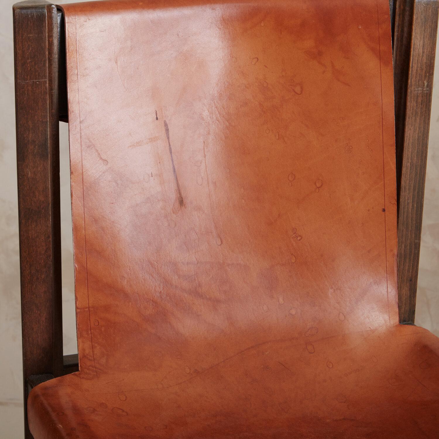 Set of 7 Saddle Leather Sling Back Dining Chairs by Jordi Vilanova 7