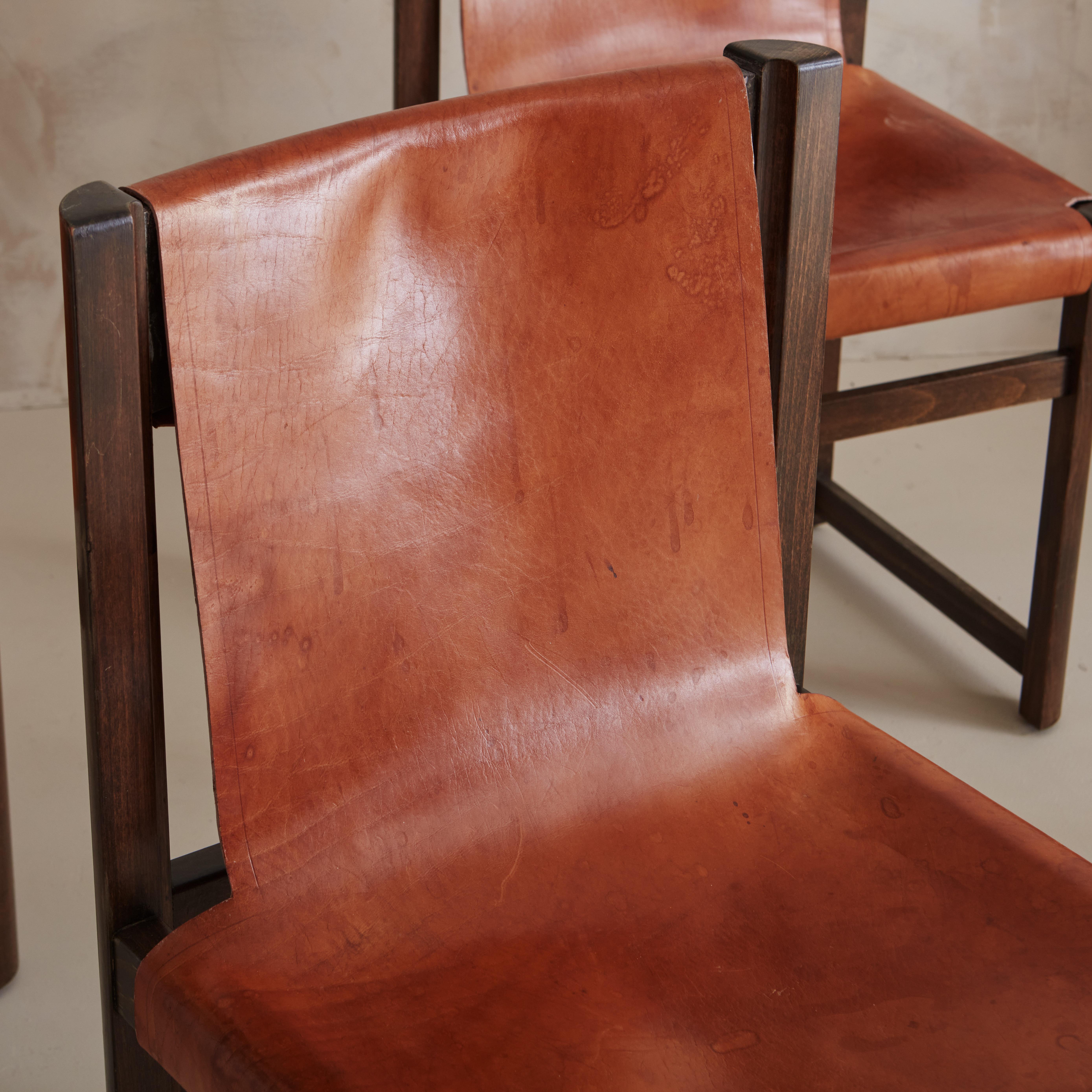 Organic Modern Set of 7 Saddle Leather Sling Back Dining Chairs by Jordi Vilanova