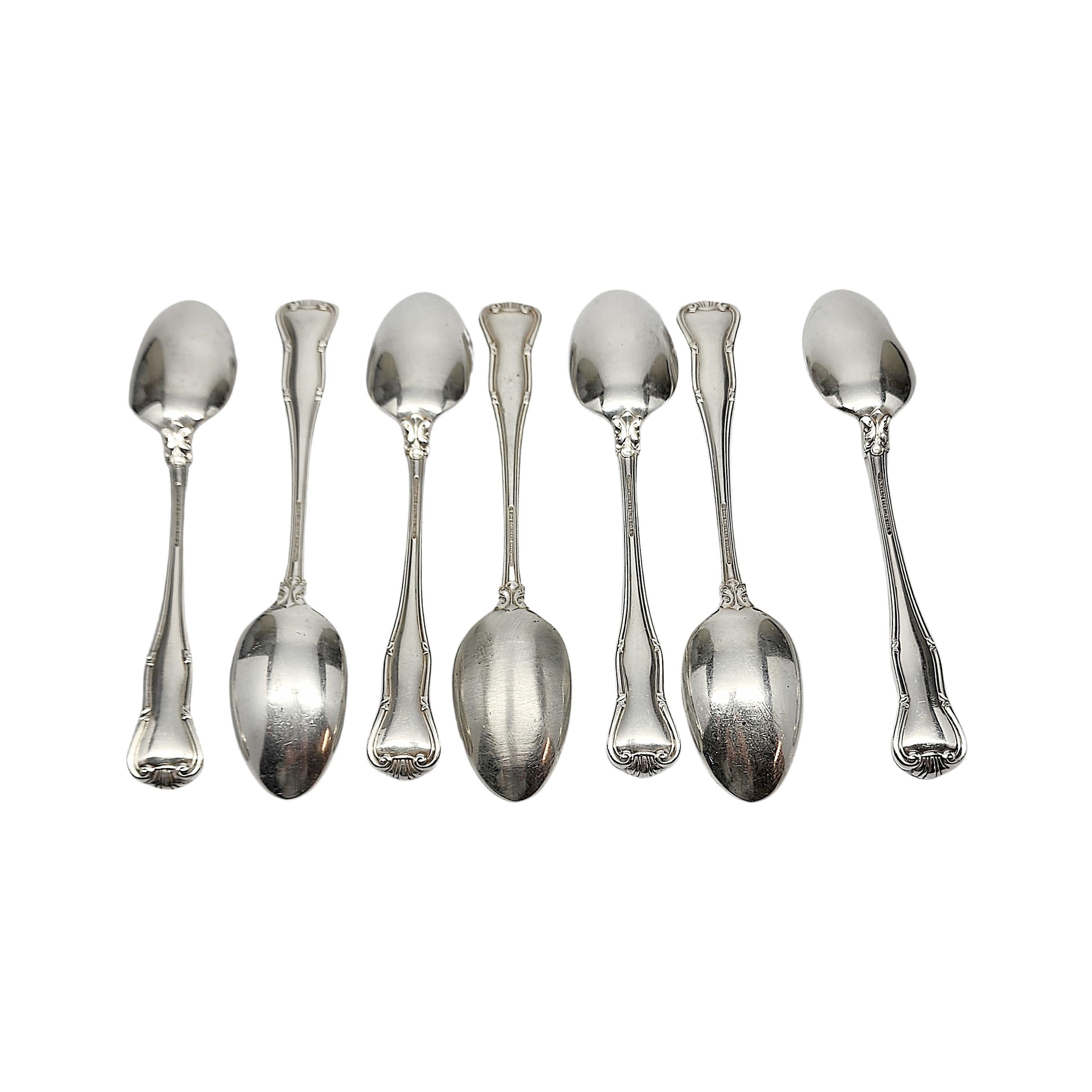 Set of 7 sterling silver teaspoons by Tiffany & Co in the Provence pattern with monogram.

Monogram appears to be U

Introduced in 1961, the Provence pattern features a crested arch, inspired by 18th Century French motifs. Hallmarks date pieces to