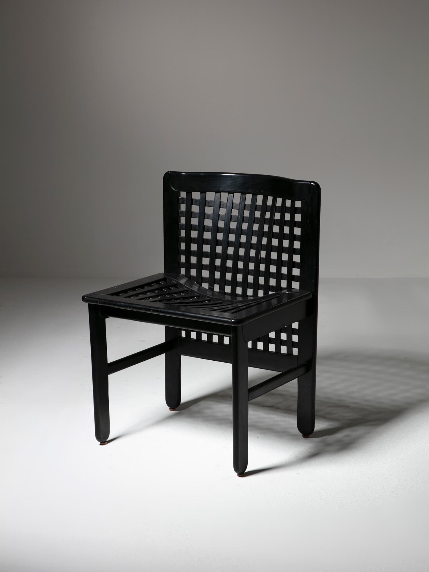Set of seven Transenna chairs by Titina Ammannati and Giampiero Vitelli for Pozzi and Verga.
Sturdy seating with wood plot backrest.