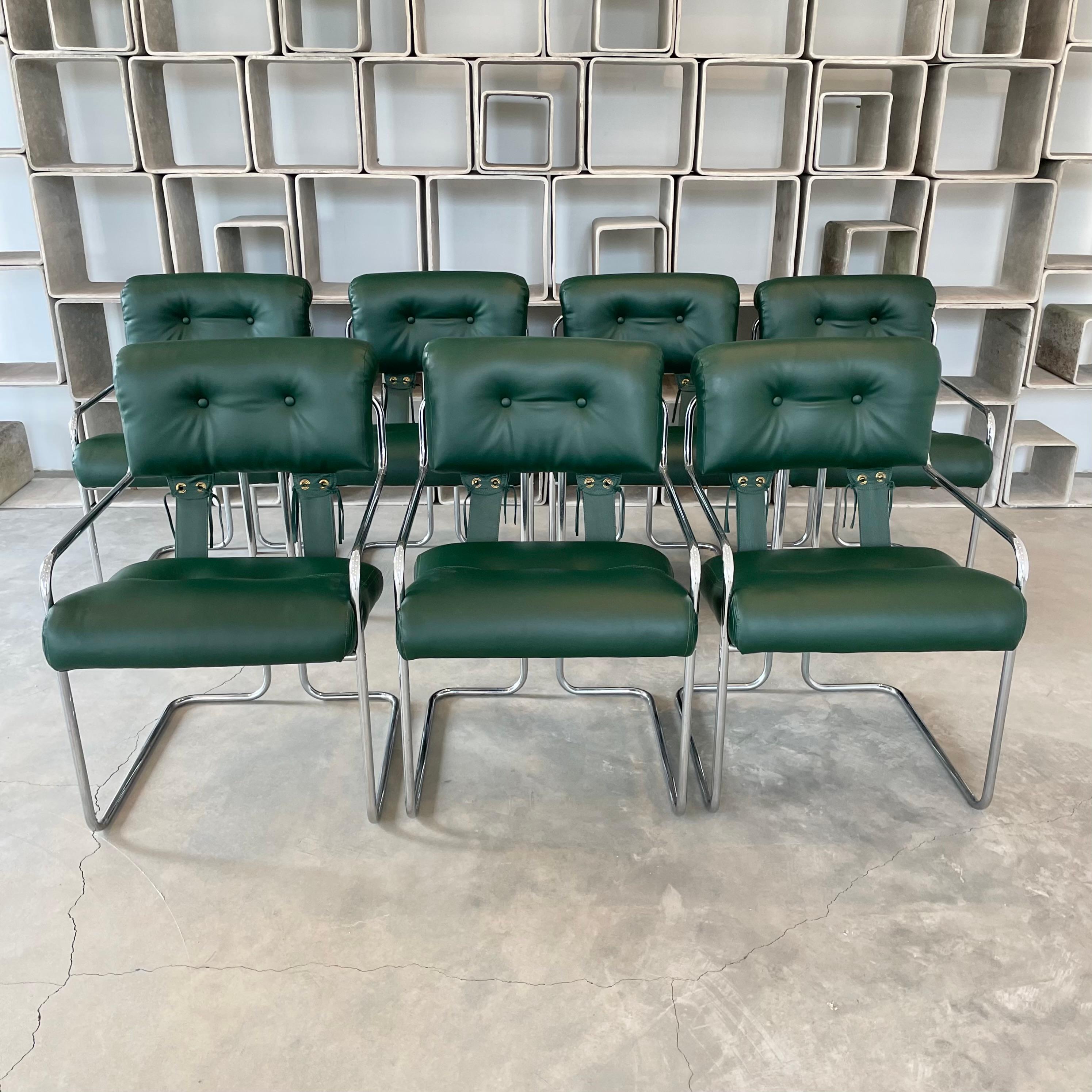 Stunning set of 7 Tucroma chairs by Guido Faleschini for Mariani, Pace. Chairs fully reupholstered in an emerald green vegan leather. Great condition to chrome and leather. Priced as a set of 7. 