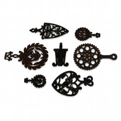 Set of 7 Vintage Cast Iron Trivets - Decorative Wall Art