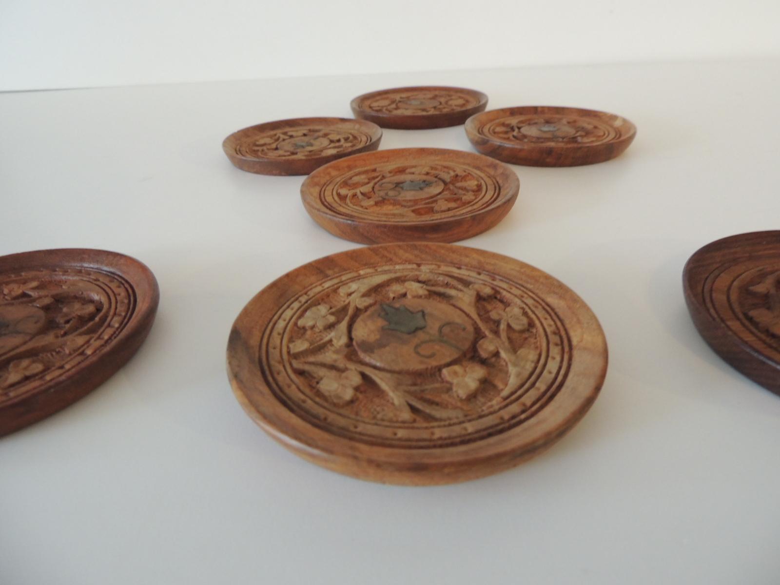 Set of (7) vintage hand carved round Indian coasters.
Size: 3.5