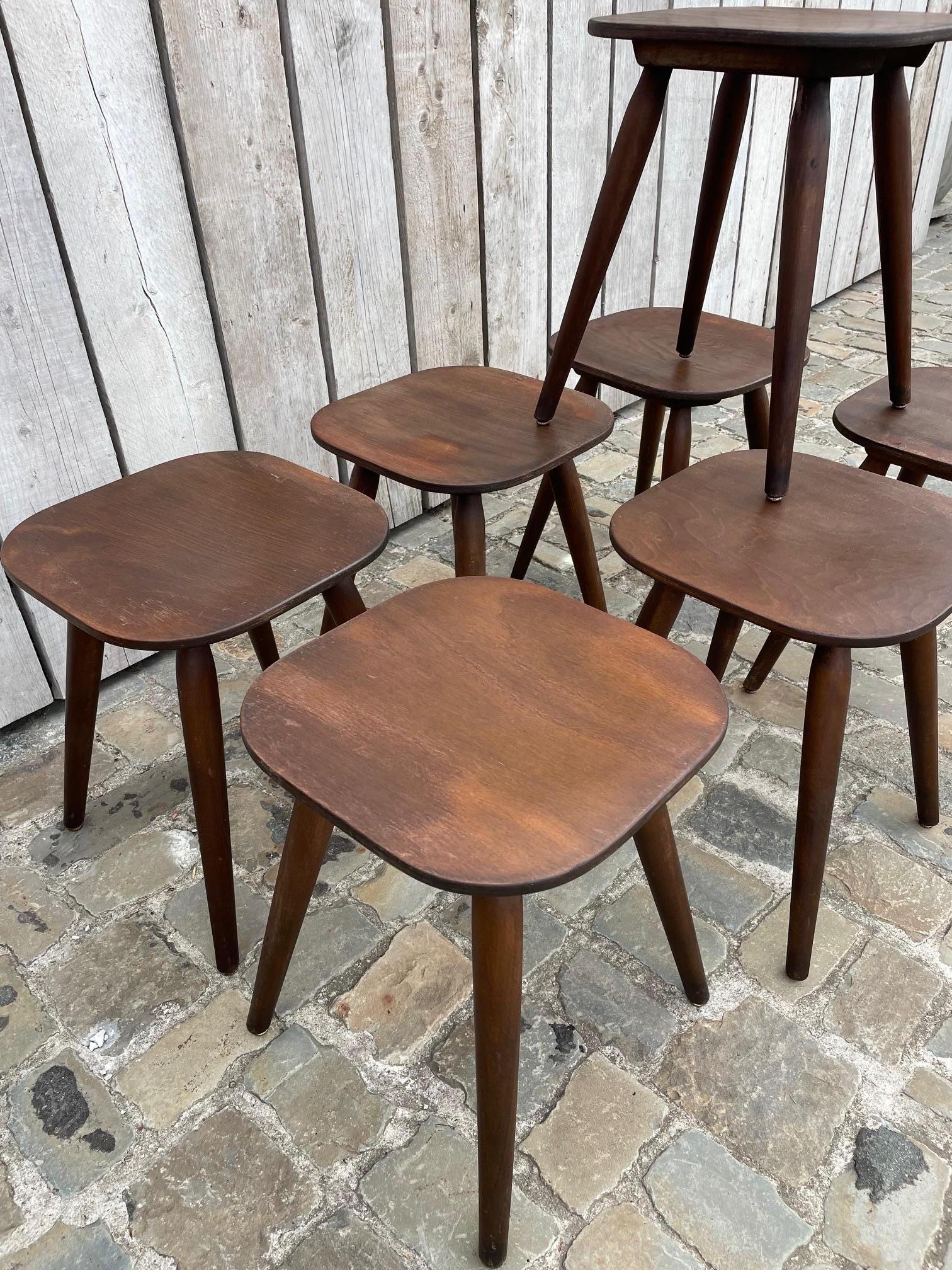 European Set of 7 vintage oak stools For Sale