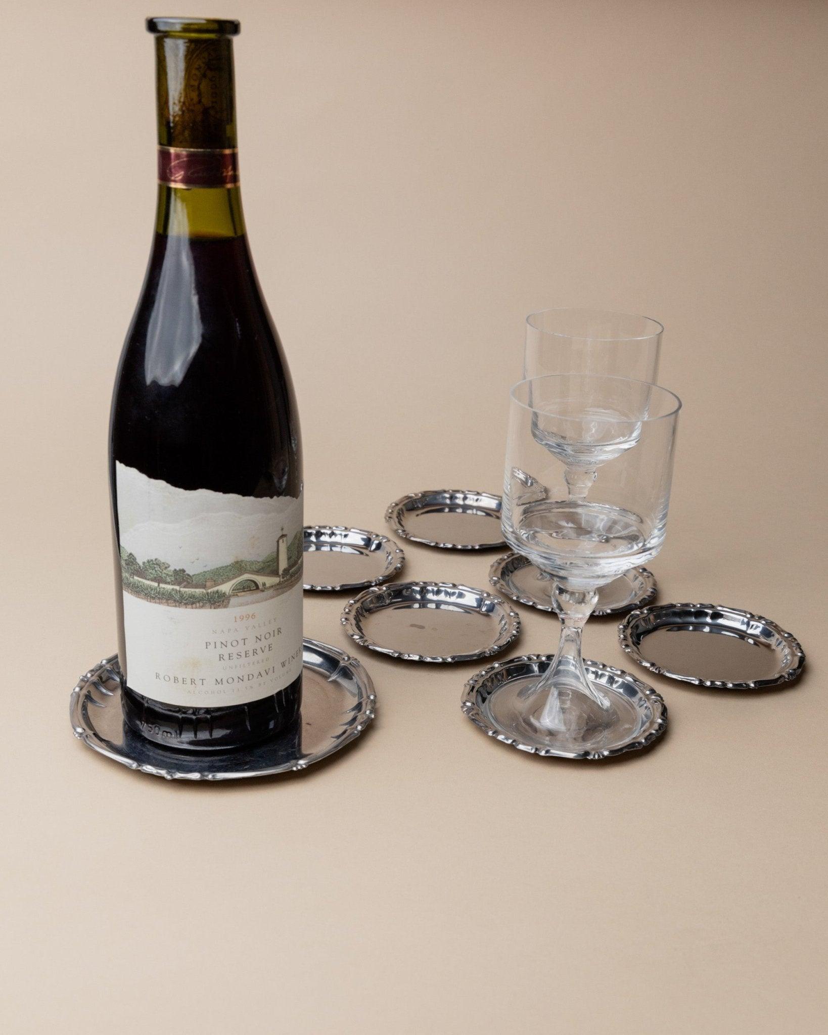 Juego de 7 posavasos vintage de acero inoxidable - 6 posavasos de cristal, 1 posavasos de botella, años 80 Italiano en venta