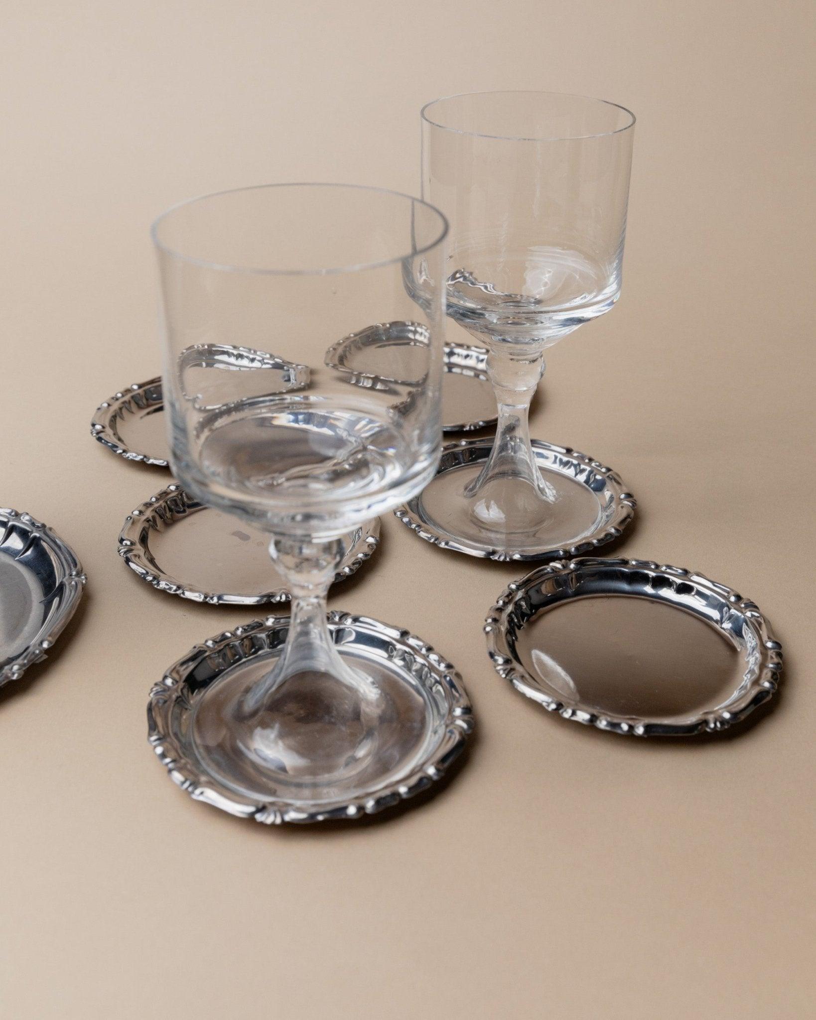 Juego de 7 posavasos vintage de acero inoxidable - 6 posavasos de cristal, 1 posavasos de botella, años 80 siglo XX en venta