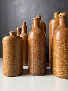 Satz von 7 Flaschenvasen aus Steingut mit Salzglasur