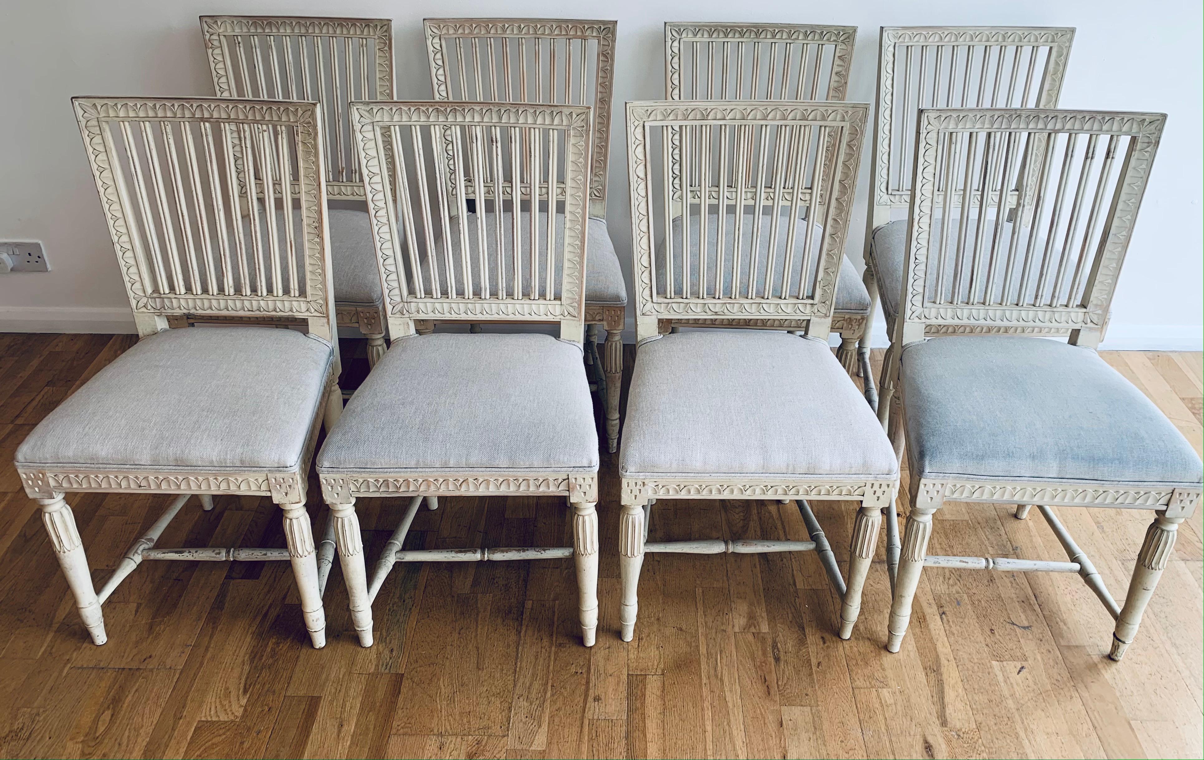 A wonderful set of 8, Swedish, Circa 1930s, stick back painted dining chairs, upholstered in a pale linen fabric. The chairs have been refreshed and repainted later. 
Measures: Height 89cms
Width 46cms
Depth 49cms
Seat height 46cms.