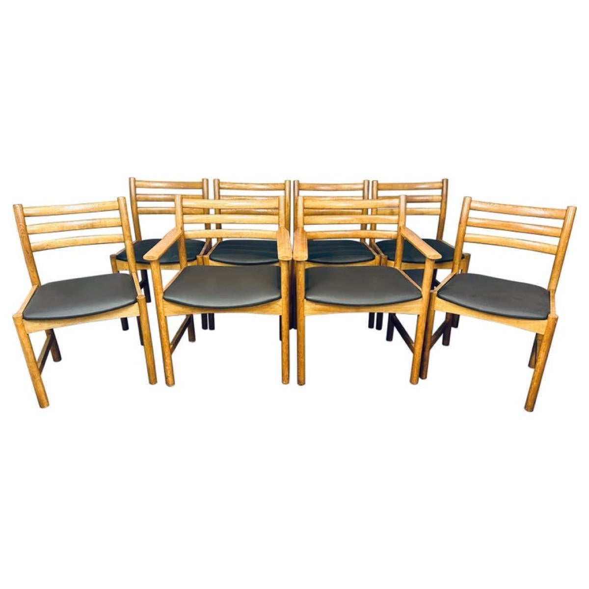 A very sturdy, well-made and functional Danish set of 6 ladder-back dining chairs (Model 350) and 2 ladder-back armchairs/carvers (Model 351) designed by Poul Volther and manufactured by Sorø Stolefabrik in the 1960s. Made from Oak and newly