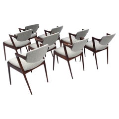 Set of 8 1960s Rosewood Kai Kristiansen Schou Andersen Model 42 Dining Chairs