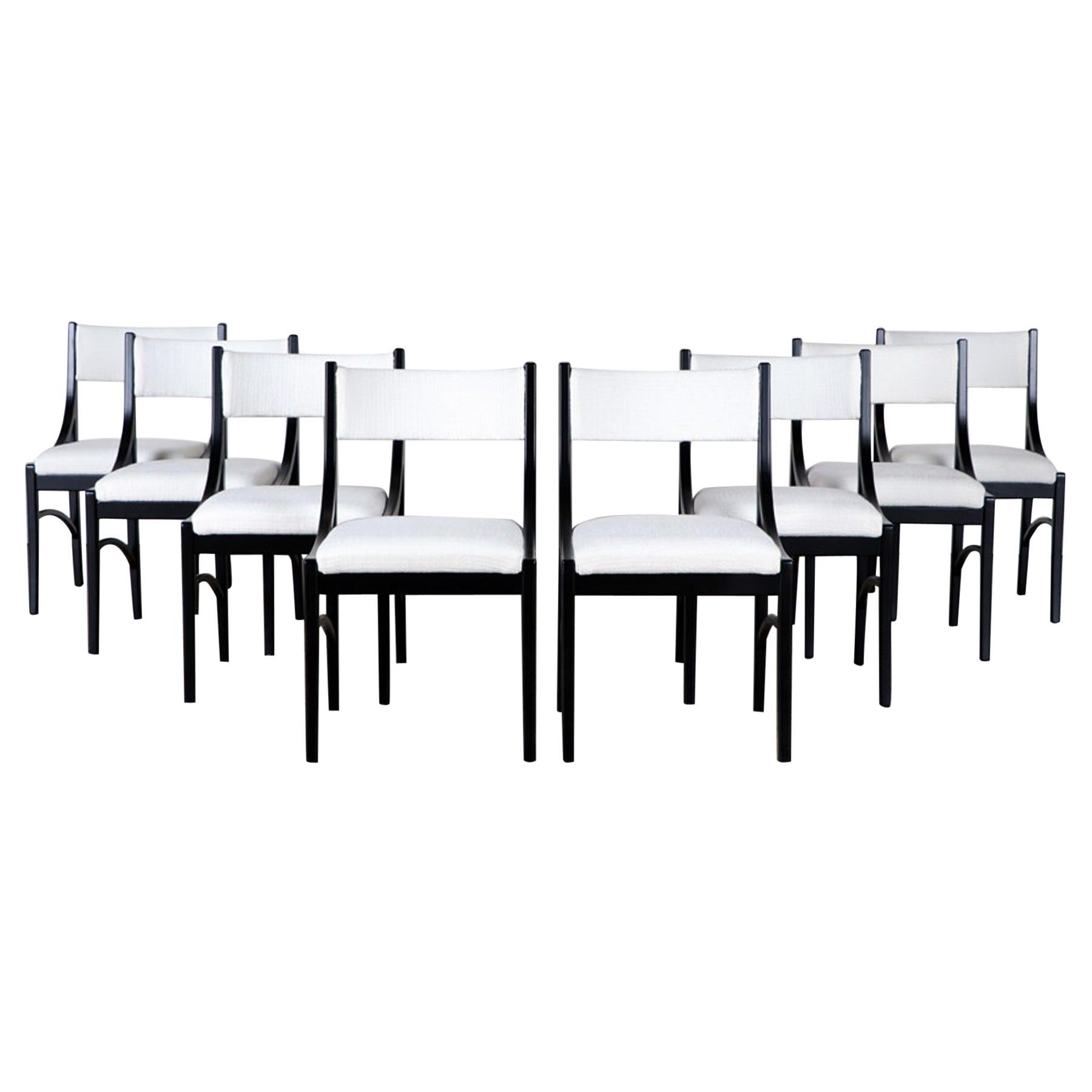 Set of vintage Ebonized Wood Dining Chairs with contemporary Boucle upholstory For Sale