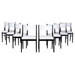 Set of vintage Ebonized Wood Dining Chairs with contemporary Boucle upholstory