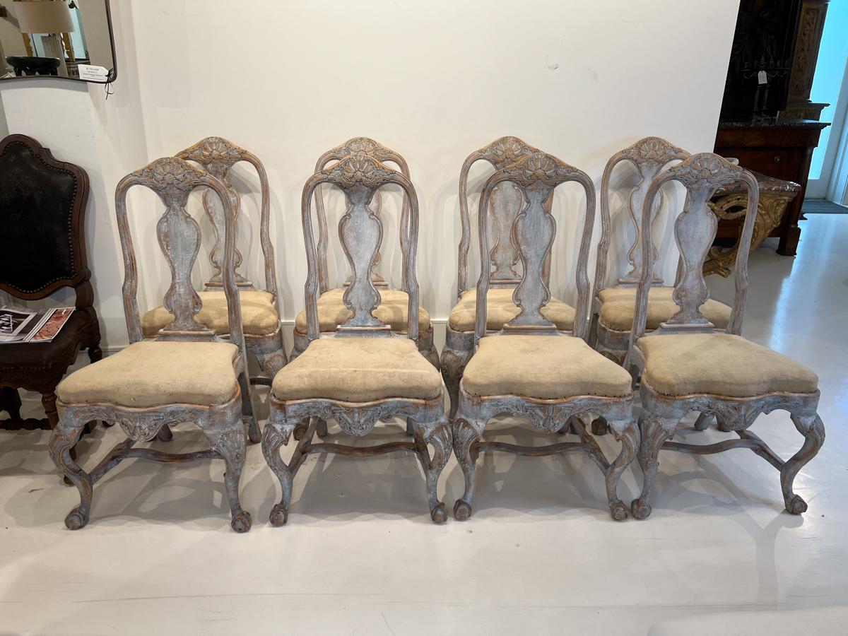These chairs exemplify the blend of functionality and artistic beauty that is characteristic of the Rococo style. Their distressed finish adds a sense of history and authenticity, making them not only practical seating options but also conversation
