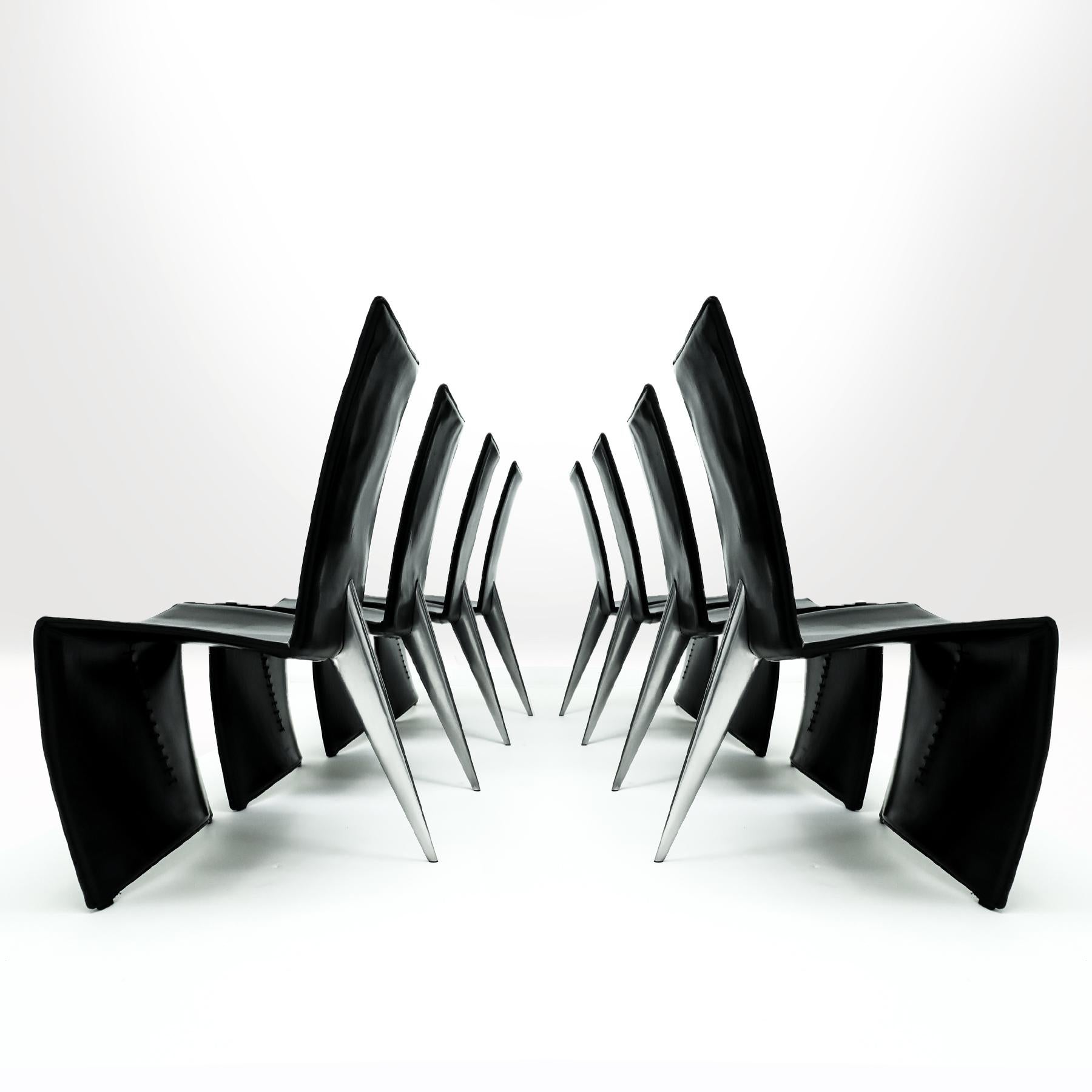 Set of 8 x 1st Edition Philippe Starck Black Leather and Aluminum Ed Archer chairs for Aleph, 1987.

The Ed Archer chair by Starck is possibly one of the most perfect representations of his early more provocative design style – the leather harness