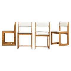 Set of 8 André Sornay solid pine chairs