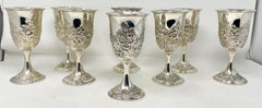 Set of 8 Antique American "Kirk" Repousse Sterling Silver Goblets, Circa 1900's.