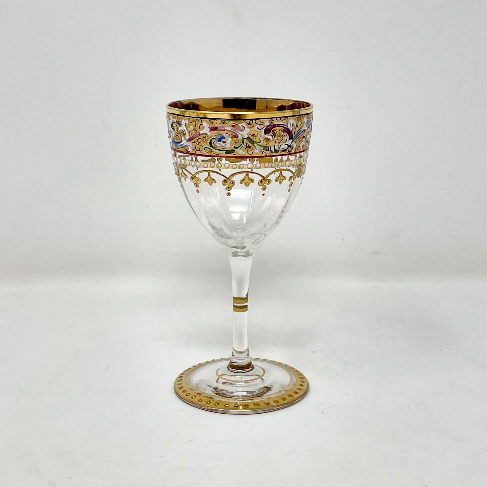 Set of 8 antique Austrian Moser glass hand-painted cordial glasses with gold leaf, circa 1890's.
Exquisite colors and workmanship.