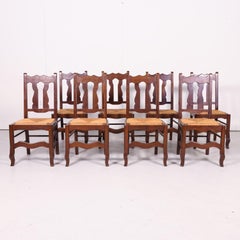Set of 8 Antique Country French Hand Carved Oak Dining Chairs with Rush Seats