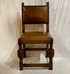 Set of 8 Antique English Jacobean Style Leather Chairs, Circa 1890-1910.