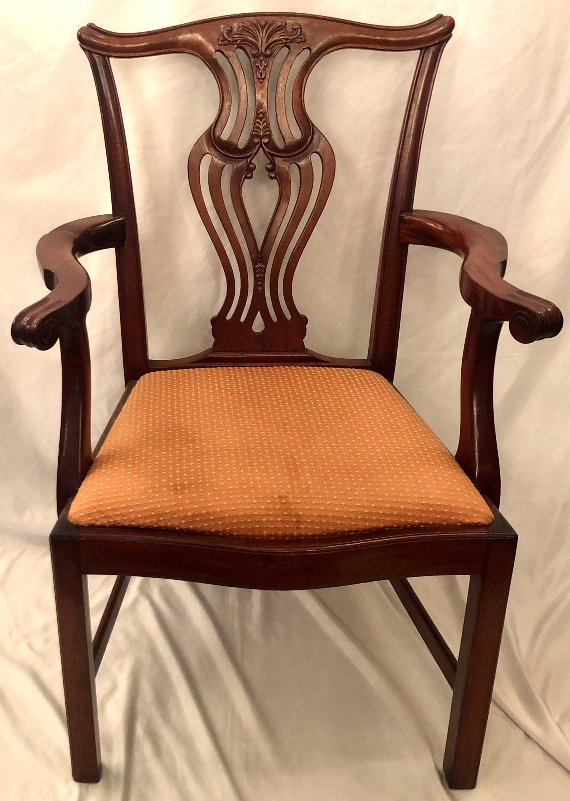 Set of 8 antique English mahogany dining chairs, circa 1910-1920.
2 arm chairs: Height - 38 1/2 inches, width - 26 inches, depth - 21 1/2 inches.
6 side chairs: Height - 38 1/2 inches, width - 21 inches, depth - 21 inches.