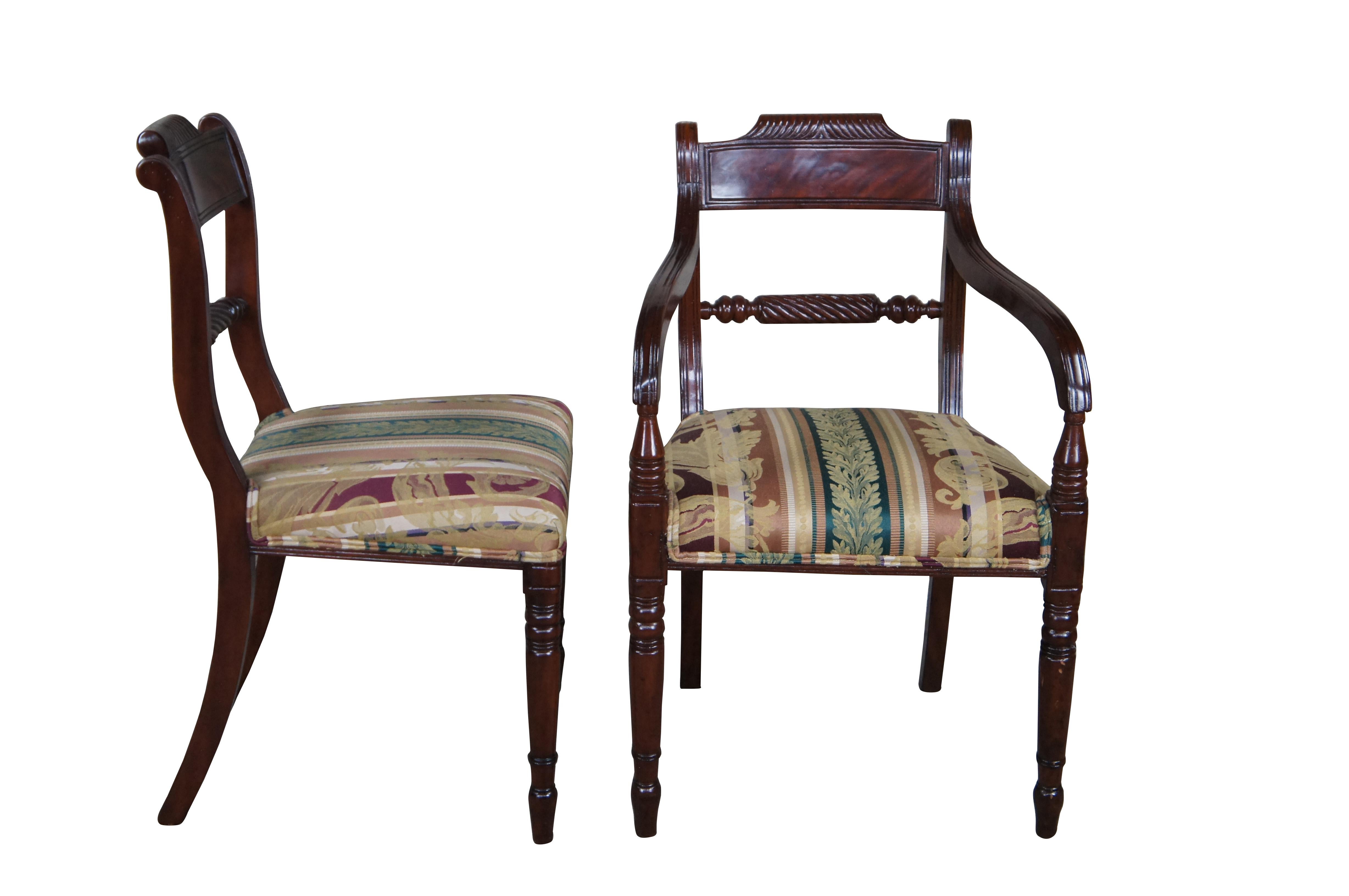 8 Antique English Regency Dining Chairs, C. 1820s.  Features a mahogany frame with rope twisted back and stately acanthus leaf floral striped seat.  Front legs are turned tapered and ribbed.  Rear legs are squared with a saber shape.    Includes two