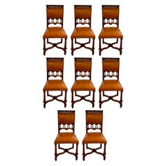 Set of 8 Antique European Carved Walnut and Leather Dining Chairs, Circa 1880.