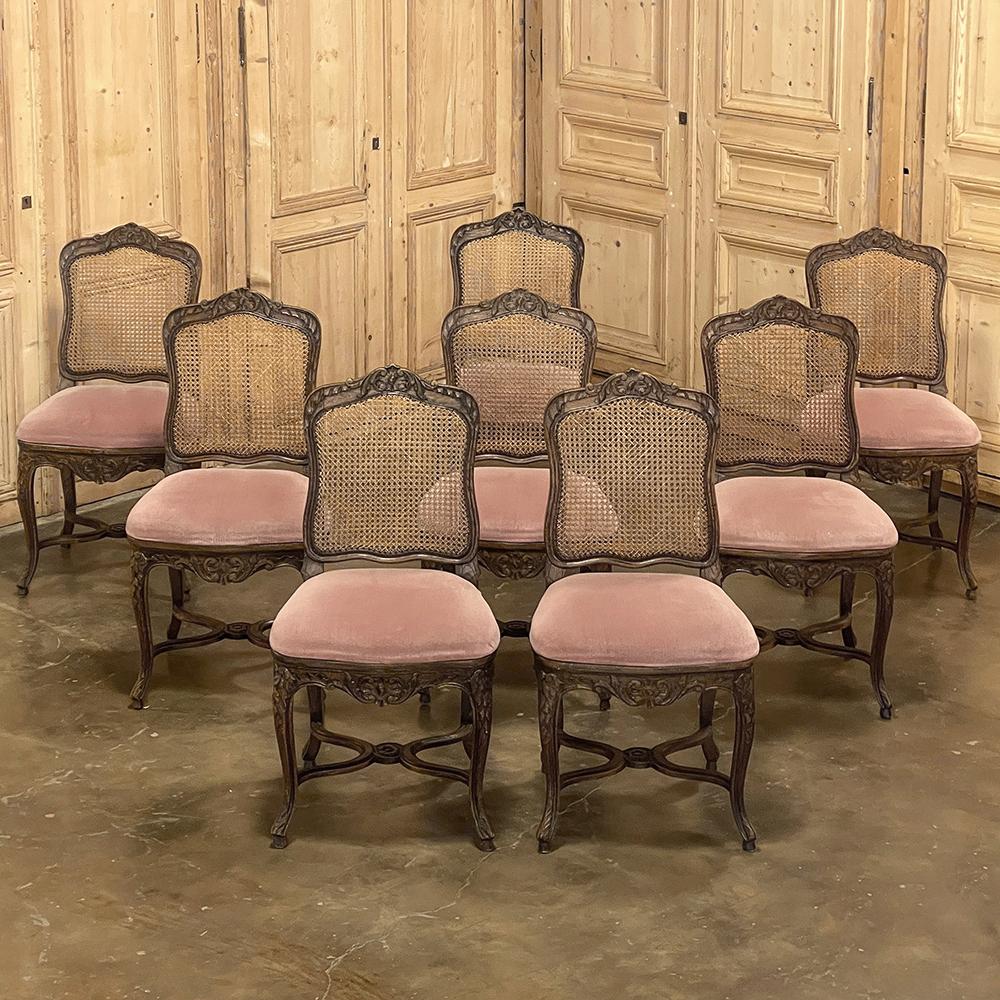 Set of 8 Antique French Louis XV Dining Chairs will ensure that you entertain in style and comfort! Hand-crafted from solid old-growth oak, each has been sculpted with graceful, naturalistic forms to create timeless visual appeal The arched