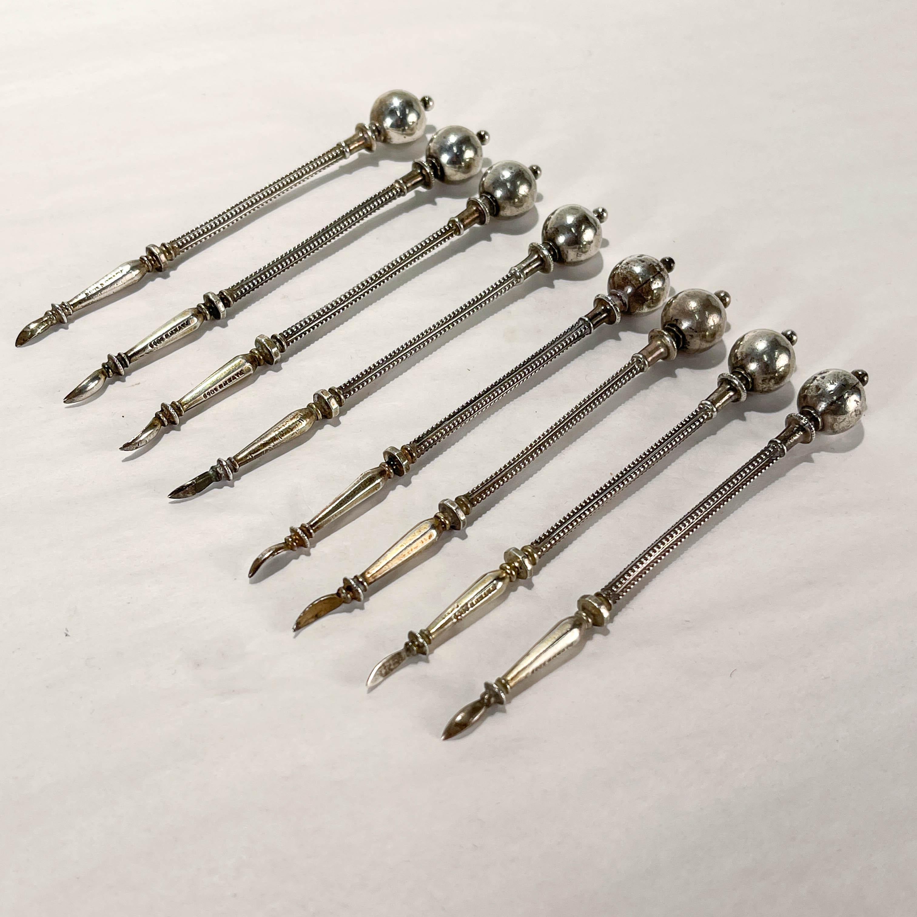 A fine set of 8 antique silver nut picks.

By George Sharp in the Ball End pattern.

In coin silver. 

Simply a great set of nut picks!

Date:
Mid-19th Century

Overall Condition:
It is in overall good, as-pictured, used estate condition.

Condition