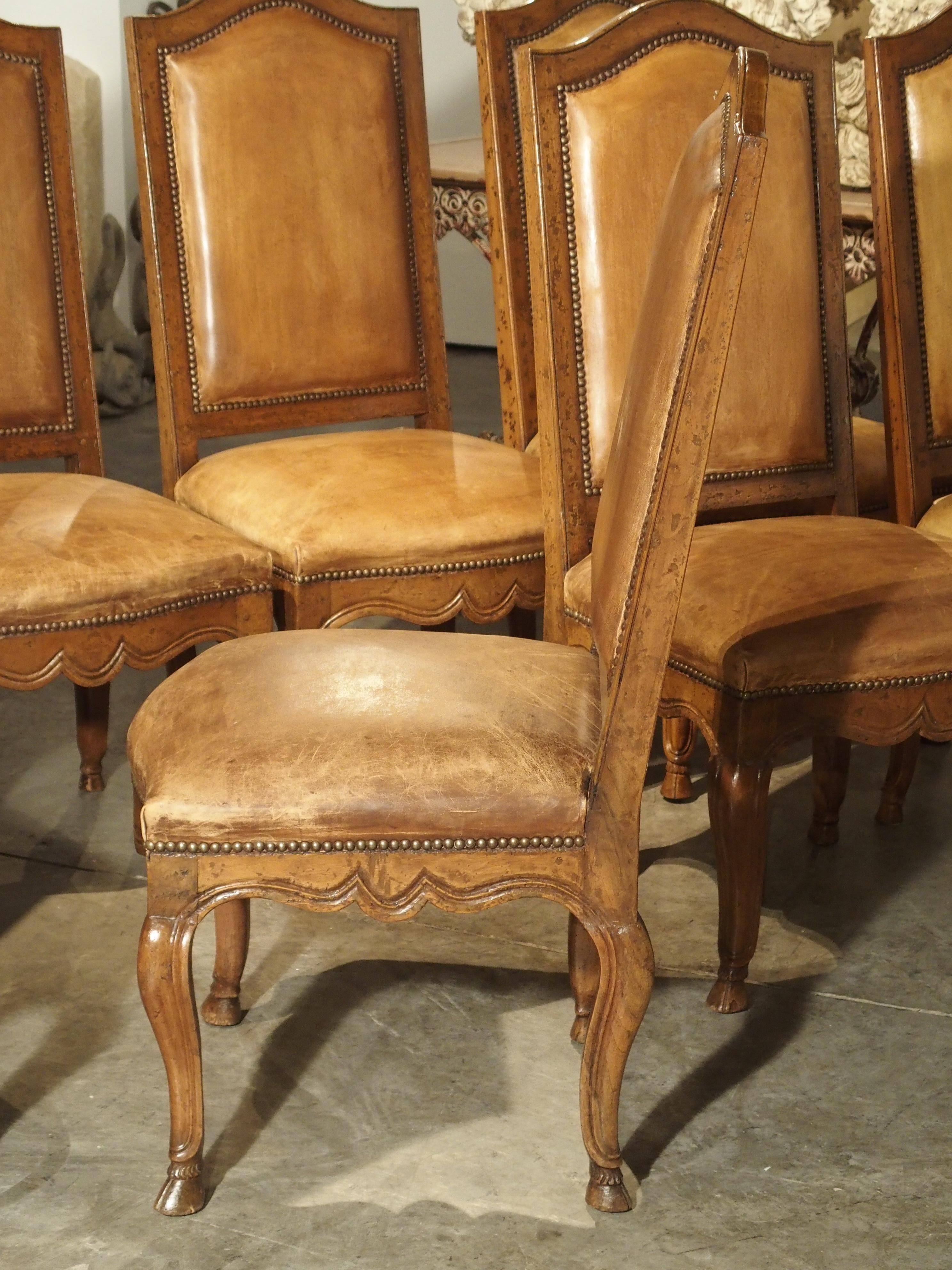 Hand-Carved Set of 8 Antique Regence Style Leather Dining Chairs from France